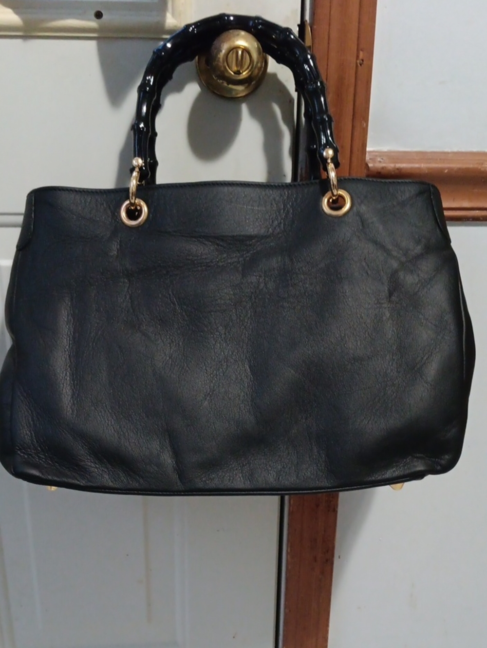 Classic Black Leather Tote Handbag with Gold Accents